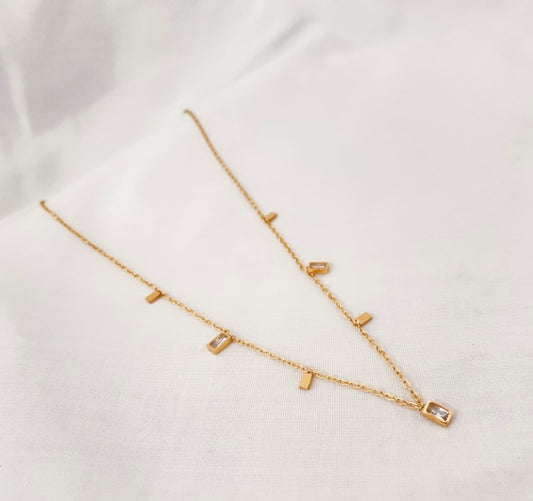 golden stainless steel necklace with small cubic zirconia pendants