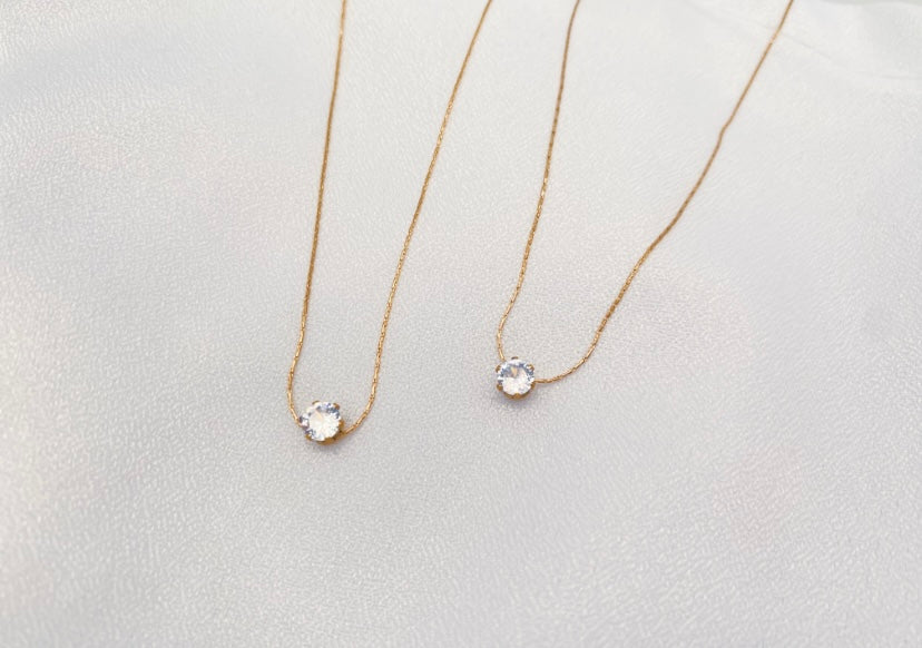 stainless steel necklace with delicate cubic zirconia pendant