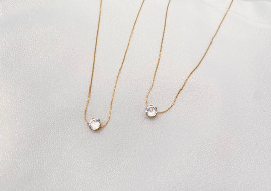 stainless steel necklace with delicate cubic zirconia pendant